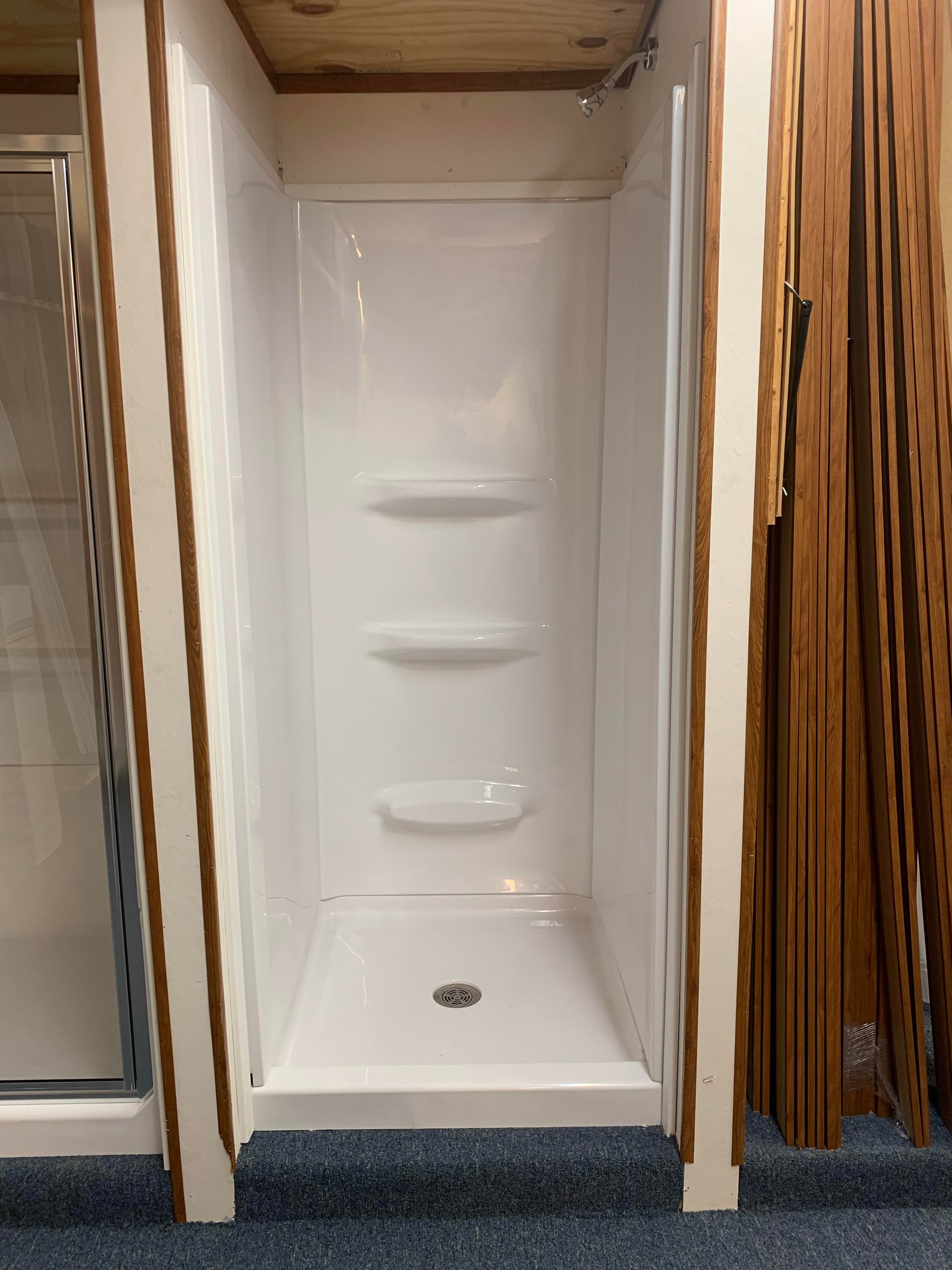 Fiberglass Prefab Shower Stalls vs Custom Tiled Showers — Degnan